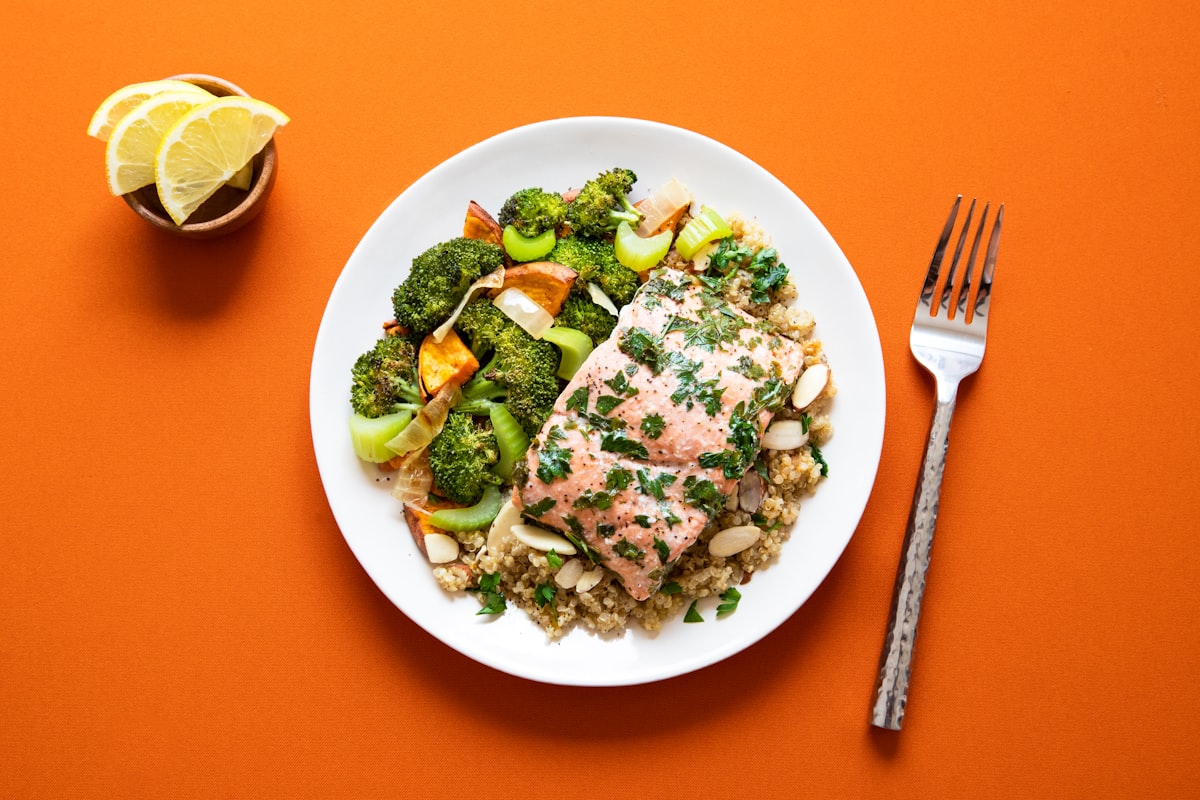 Balanced diet plate with protein, vegetables, and whole grains
